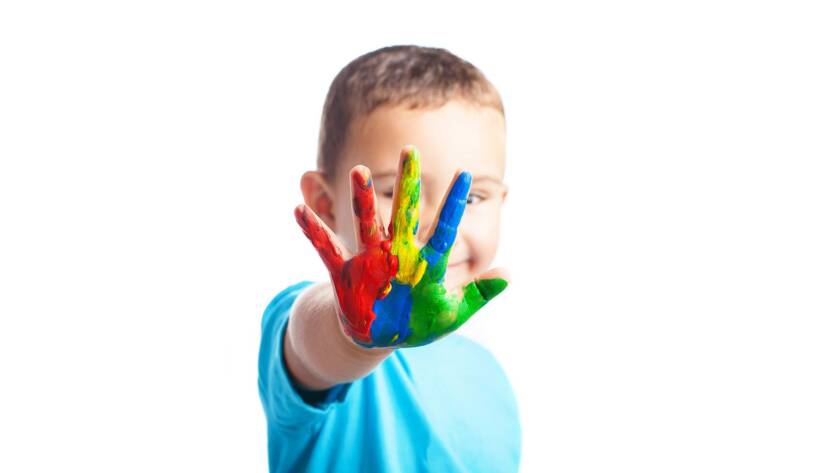 child showing hand painted