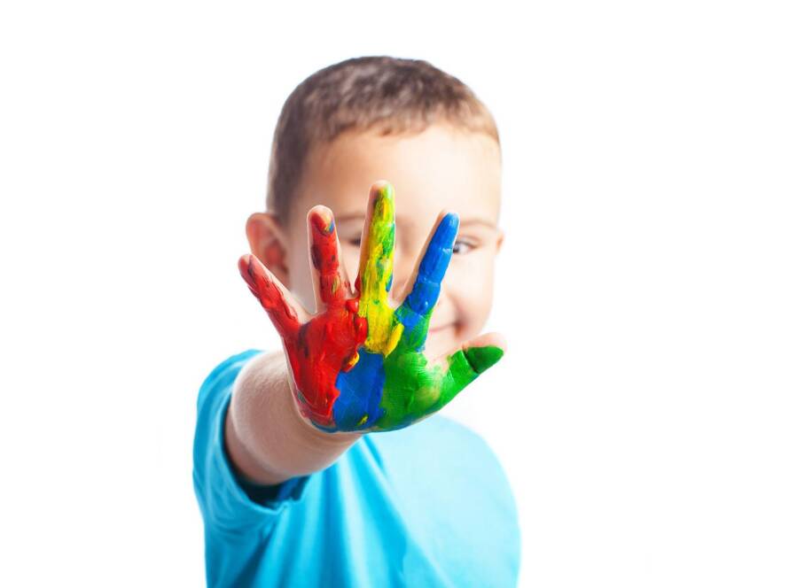 child showing hand painted