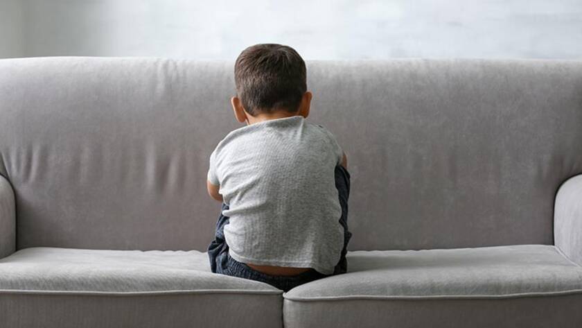 child siting back to the camera